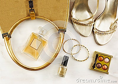 Women's set of fashion accessories in golden color Stock Photo