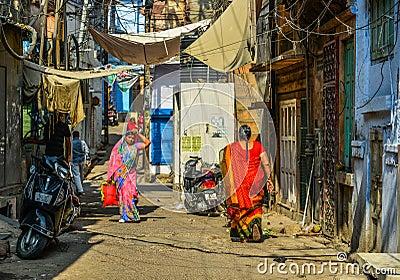 Women in saree walking on street Editorial Stock Photo