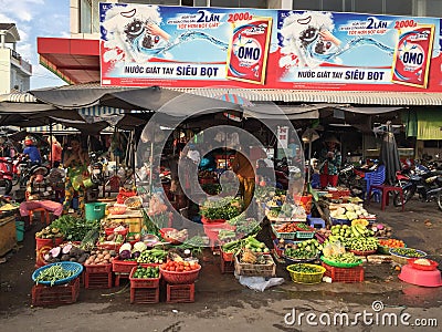 A women sell fresh vegetables and fruit at the central city mark Editorial Stock Photo