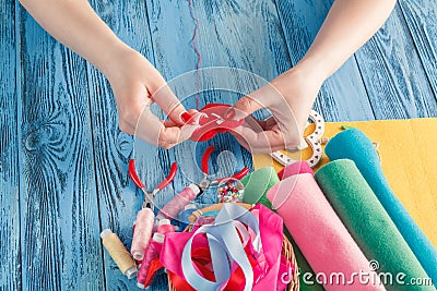 Women sews by hand and making handmade heart Stock Photo