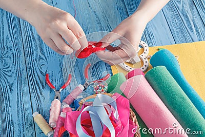 Women sews by hand and making handmade heart Stock Photo