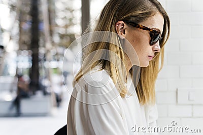 Women Sitting Thinking Alone Outdoors Stock Photo