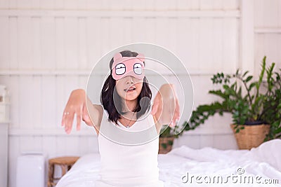 Woman sleepwalker with somnambulism sleep and walking in bedroom Stock Photo