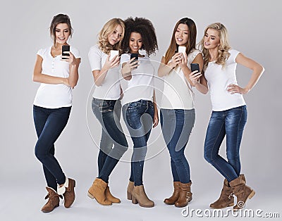 Women with smart phones Stock Photo
