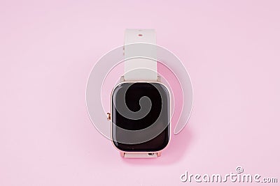 A women smart watch on pink background Stock Photo