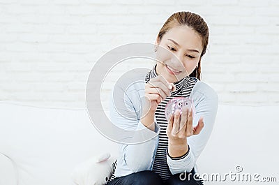 Women smiling in savings. Stock Photo