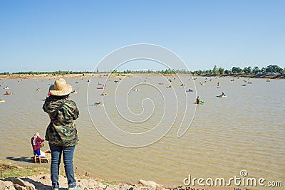 Women standing by the lake Editorial Stock Photo