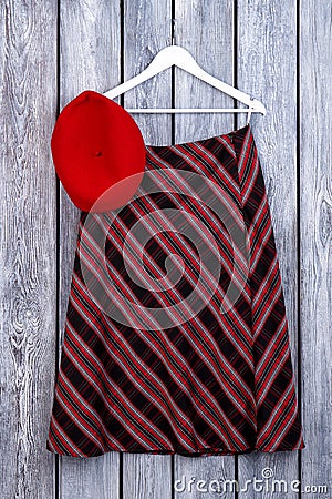 Women striped skirt hanging on hanger. Stock Photo