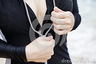 The women take off swimsuit Stock Photo