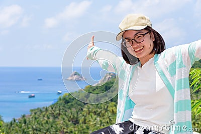 Women tourists extend the arms happily Stock Photo
