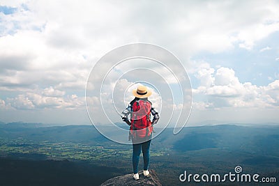 Women tourists in the midst of peaceful nature, Traveling of tourists only to find peaceful atmosphere Stock Photo