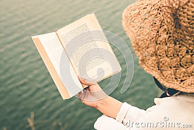 Women tourists read book in the holiday in quiet nature, Concept reading a book Stock Photo