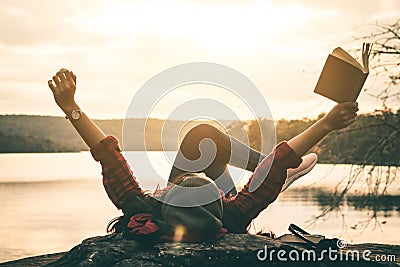 Women tourists read books. Stock Photo