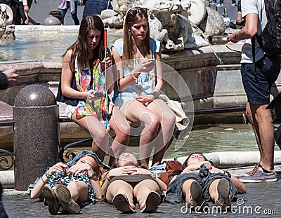 Women tourists in Rome. Three tourists on the ground Editorial Stock Photo