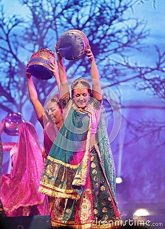 Women in traditonal costumes in Mystic India show Bahrain Editorial Stock Photo