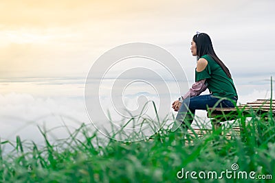 Women travel mountain view and fog Stock Photo