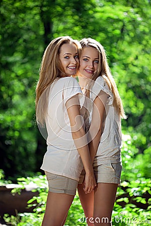 Women, twins in the forest Stock Photo
