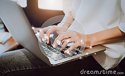 Women using a laptop in the display and technology advances in stores. Take your screen to put on advertising. Stock Photo
