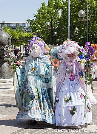 Women in Venetian costume parading Editorial Stock Photo