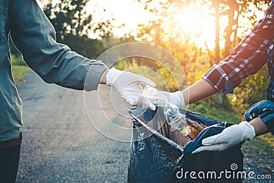 Women volunteer help garbage collection charity. Stock Photo