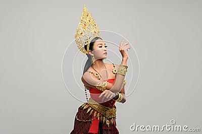 Women wear Thai clothes as a symbol. The right hand is placed on the left hand Stock Photo