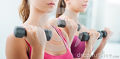Women weightlifting at the gym Stock Photo