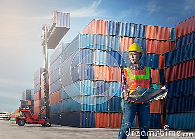 Women woker control loading Containers box Stock Photo