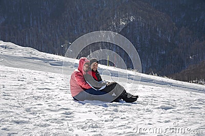 Wintertime: time to have fun in a ski resort. Snow, mountain, holiday. Stock Photo