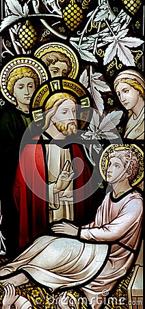 Wonder of Jesus: curing a sick man in stained glass Stock Photo