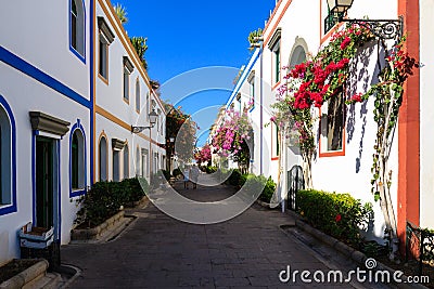 Wonderful alley with colorful flowers in Puerto De Mogan Editorial Stock Photo
