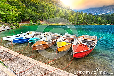 Wonderful alpine landscape and colorful boats,Lake Fusine,Italy,Europe Stock Photo