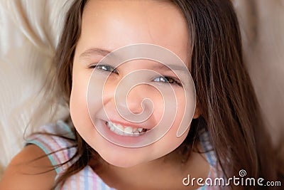 Wonderful bright smiling little girl, closeup portrait Stock Photo