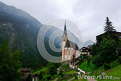wonderful church in a little village in the mountains on vacation Stock Photo