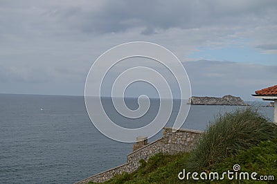 Wonderful Cliffs Next To The Lighthouse In Suances. Stock Photo
