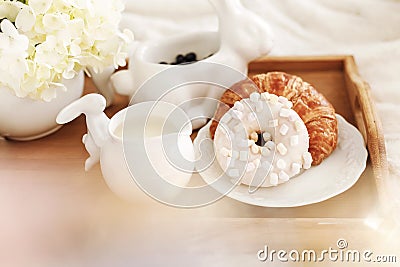 A wonderful day off in bed, milk, happiness, romance, love, happiness, together, breakfast, croissant, cake, coffeeÃ ÂÂ¼ Stock Photo