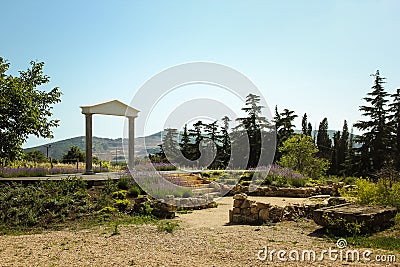 The wonderful Greek arch. amazing views of the vineyards and mountains of Crimea and flowering lavender. beautiful landscape of Stock Photo