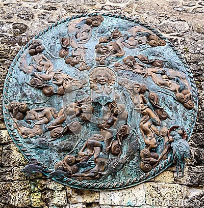 Wonderful Medieval Pattern on Circular Manhole Cover in old town, Gruyere, Fribourg, Switzerland, Europe Stock Photo