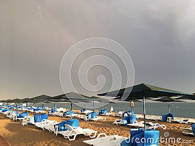 Wonderful rainbow over the sea and the beach in Turkey after heavy rain Stock Photo