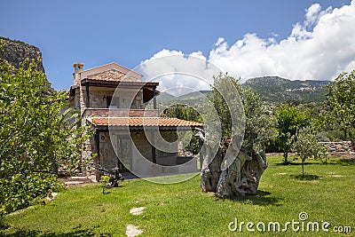 A wonderful stone house in green nature Stock Photo