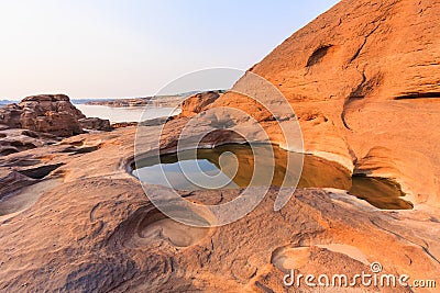 Wonderful stone land is under big river, it can over the water while water was reduced in Hot season Stock Photo