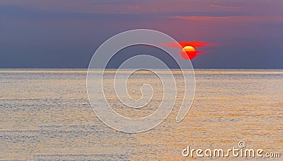 Wonderful sunrise over a calm sea Stock Photo