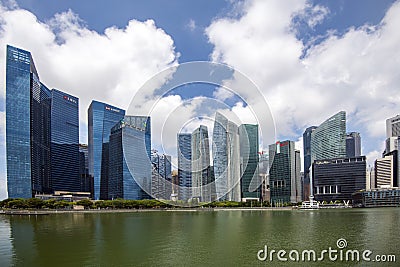 Singapore commercial and banking skyscrapers seen from Marina Bay Sands Shopping Centre at Singapore Harbour Editorial Stock Photo