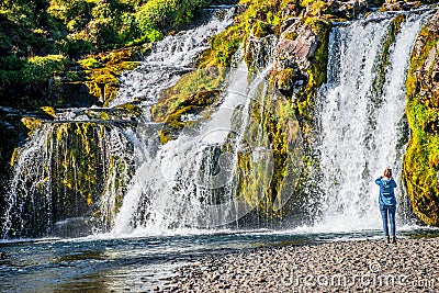Wonderful waterfal Kirkjufellsfossl in Iceland in Autumn colors Editorial Stock Photo