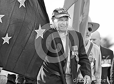 Old Australian Navy veteran leads Anzac Day parade flag bearer Editorial Stock Photo