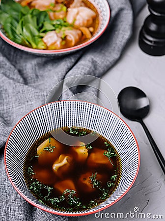 Wonton soup bowl. shrimp or pork wonton soup with green onion Stock Photo