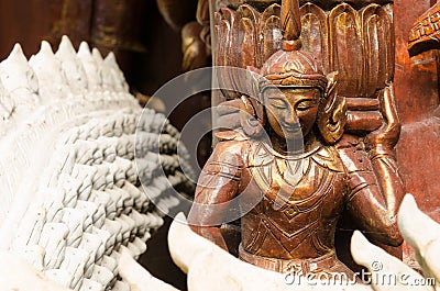 Wood angel statue in the temple Stock Photo