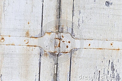 Wood backgrounds Old door from darkened boards with archaic iron plates Stock Photo