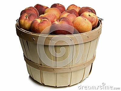 Wood basket with peaches Stock Photo