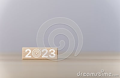 wood block Cube with text 2023. Investment startup concept. Implementation of the New Year 2023 goals and strategies to develop Stock Photo