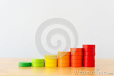 Wood block multicolor arranging stack step as staircase on wooden table Stock Photo